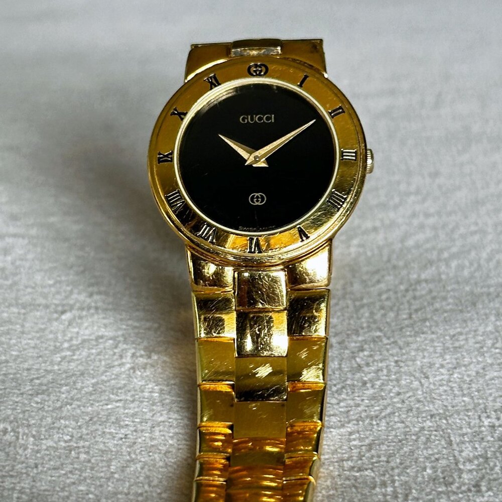 Vintage Gucci 3300L Women's Gold Watch with Black Dial